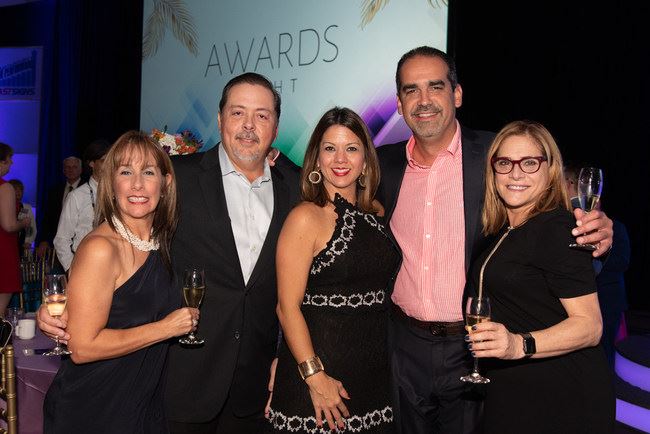 Jose Corujo, Juan A. Rivera, and Teresa Caballero are recognized by the IFA Franchise of the Year Award